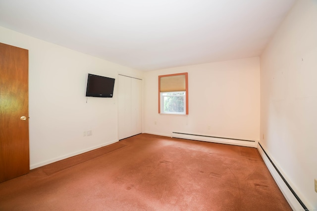 57 Apple Tree Ln, Hamden, CT 06518 - carpeted empty room with baseboard heating and a baseboard radiator