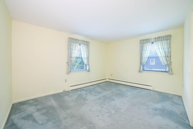 57 Apple Tree Ln, Hamden, CT 06518 - carpeted empty room featuring healthy amount of natural light and a baseboard heating unit