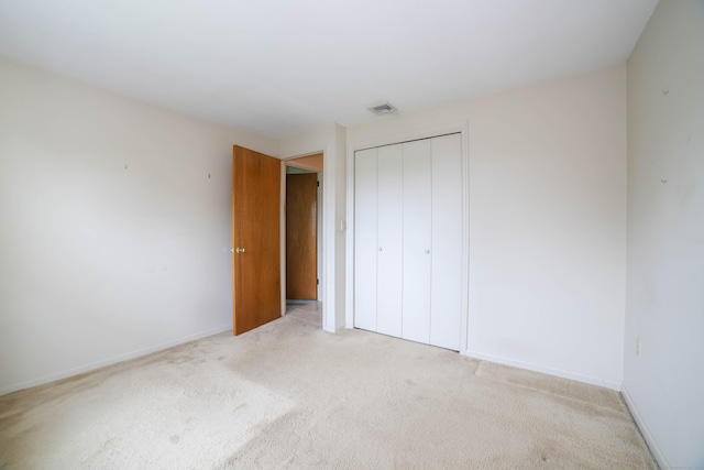 57 Apple Tree Ln, Hamden, CT 06518 - unfurnished bedroom with light carpet and a closet