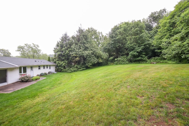 57 Apple Tree Ln, Hamden, CT 06518 - view of grassy yard featuring a patio