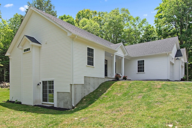 6 S Bear Hill Rd, Chaplin, CT 06235 - view of front of house featuring a front yard, a shingled roof, and covered porch