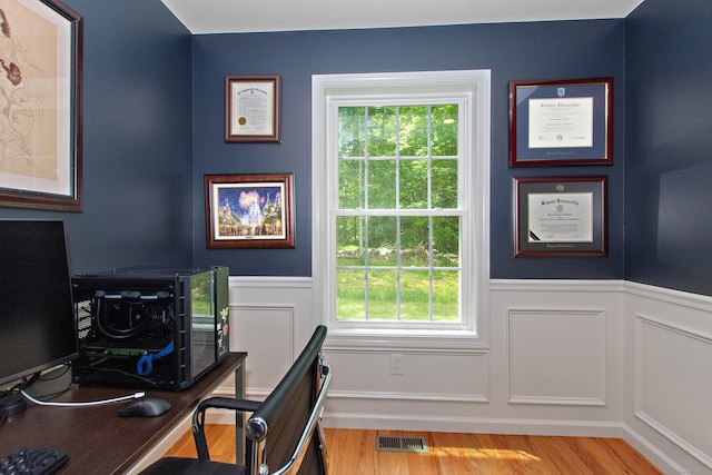 6 S Bear Hill Rd, Chaplin, CT 06235 - office with wainscoting, wood finished floors, and a decorative wall