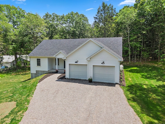 6 S Bear Hill Rd, Chaplin, CT 06235 - view of front of home featuring a garage, driveway, a front lawn, and roof with shingles