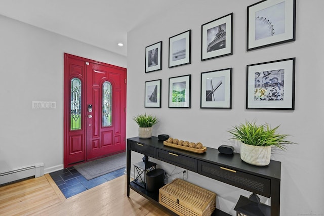 10 Eric Ct, Norwalk, CT 06851 - entryway with recessed lighting, a baseboard heating unit, and wood finished floors