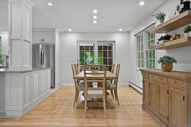 10 Eric Ct, Norwalk, CT 06851 - dining space featuring plenty of natural light, light wood-style flooring, recessed lighting, and a baseboard heating unit