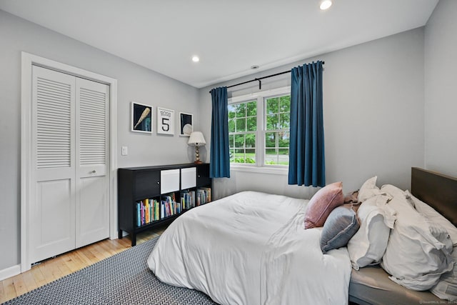 10 Eric Ct, Norwalk, CT 06851 - bedroom with hardwood / wood-style flooring, recessed lighting, and a closet
