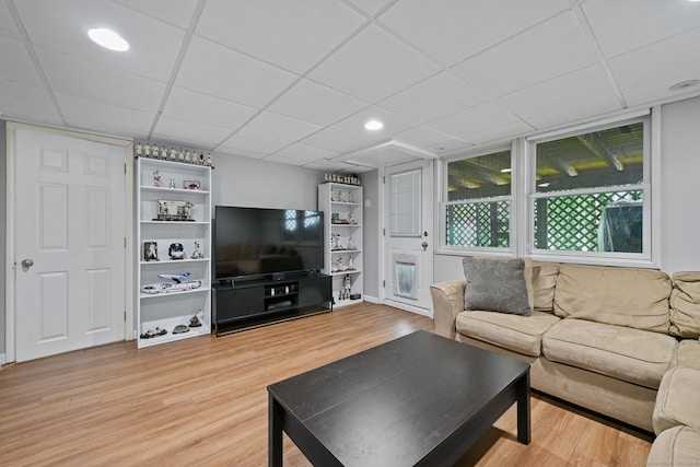 10 Eric Ct, Norwalk, CT 06851 - living room with light wood finished floors and a paneled ceiling