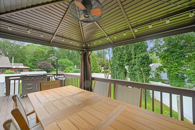 10 Eric Ct, Norwalk, CT 06851 - wooden terrace featuring outdoor dining area, area for grilling, and view of scattered trees