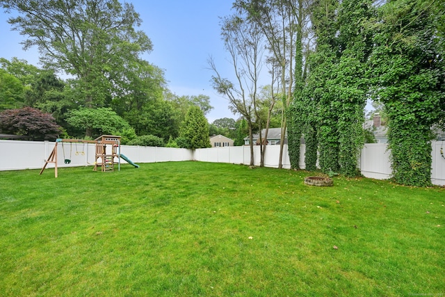 10 Eric Ct, Norwalk, CT 06851 - fenced backyard with a playground