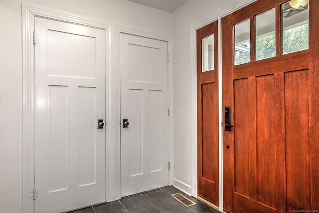 90 Edgewood Way, New Haven, CT 06515 - entrance foyer featuring dark tile patterned flooring and baseboards