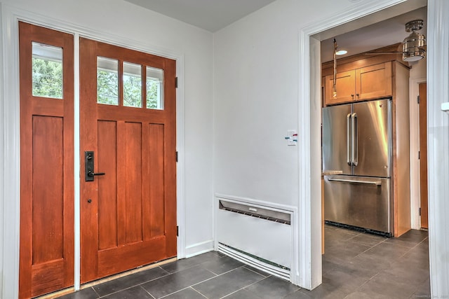 90 Edgewood Way, New Haven, CT 06515 - foyer entrance featuring dark tile patterned floors and baseboards