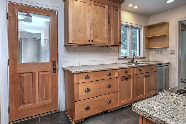 90 Edgewood Way, New Haven, CT 06515 - kitchen with decorative backsplash, light stone counters, dark tile patterned floors, dishwasher, and open shelves
