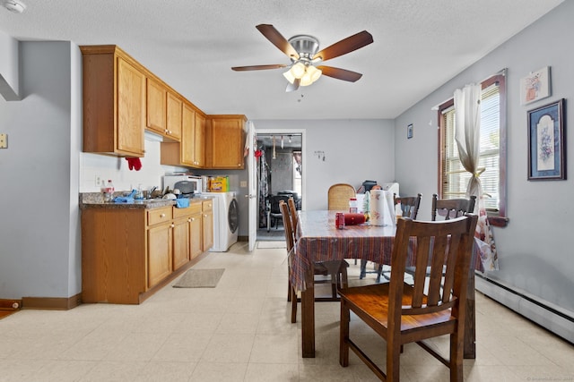 52 Colony St, Bristol, CT 06010 - dining space featuring a baseboard radiator, a ceiling fan, and washer / dryer