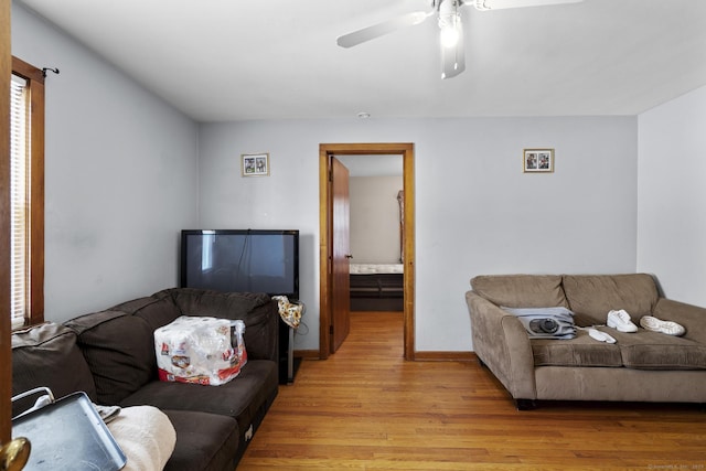 52 Colony St, Bristol, CT 06010 - living room with light wood-style flooring and ceiling fan