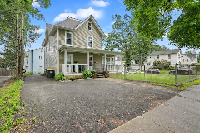 17 Pleasant St, Danbury, CT 06810 - view of front facade with covered porch and asphalt driveway
