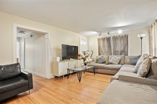 17 Pleasant St, Danbury, CT 06810 - living room with light wood-style flooring and track lighting