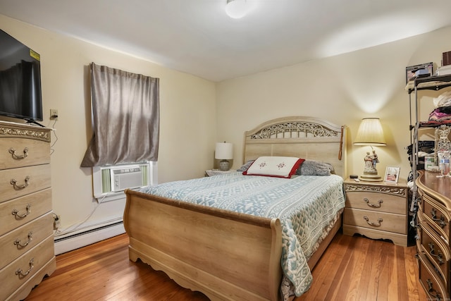 17 Pleasant St, Danbury, CT 06810 - bedroom with a baseboard heating unit, hardwood / wood-style floors, and cooling unit