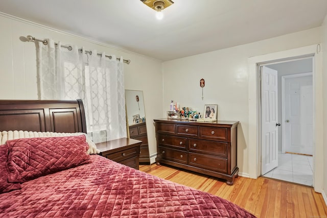 17 Pleasant St, Danbury, CT 06810 - bedroom featuring wood finished floors and a baseboard radiator