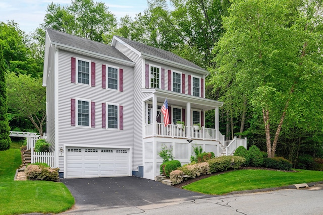 7 Concord Ct Unit 7, Southbury, CT 06488 - colonial house with driveway, an attached garage, stairs, a porch, and a front lawn