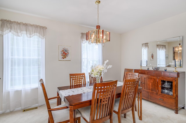 7 Concord Ct Unit 7, Southbury, CT 06488 - dining space featuring a chandelier and light colored carpet