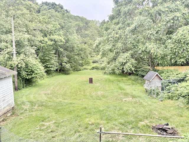 154 Golden St, Norwich, CT 06360 - view of grassy yard with a storage shed