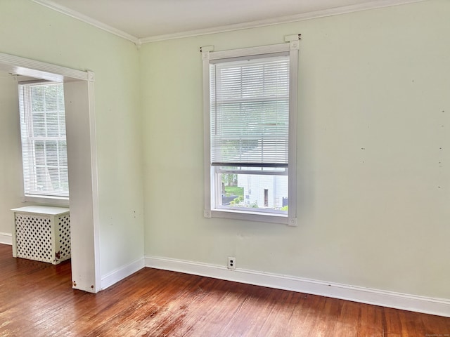 154 Golden St, Norwich, CT 06360 - unfurnished room with wood finished floors and crown molding