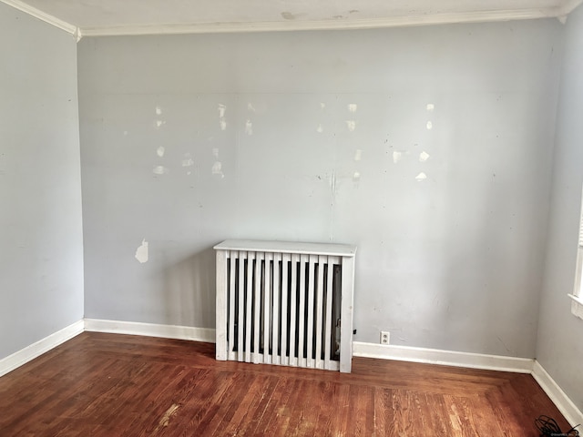 154 Golden St, Norwich, CT 06360 - unfurnished room featuring ornamental molding, radiator heating unit, and wood finished floors