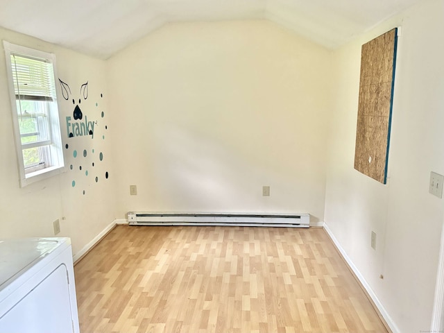 154 Golden St, Norwich, CT 06360 - empty room featuring baseboard heating, light wood-style floors, washer / clothes dryer, and vaulted ceiling