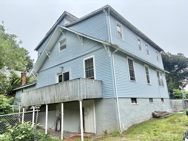 154 Golden St, Norwich, CT 06360 - rear view of property with a deck
