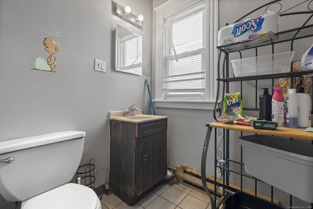 53 Norton St, Bristol, CT 06010 - half bath featuring vanity and tile patterned floors