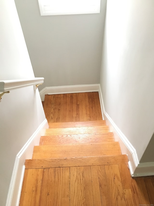 1333 Blue Hills Ave, Bloomfield, CT 06002 - stairs with baseboards and wood finished floors