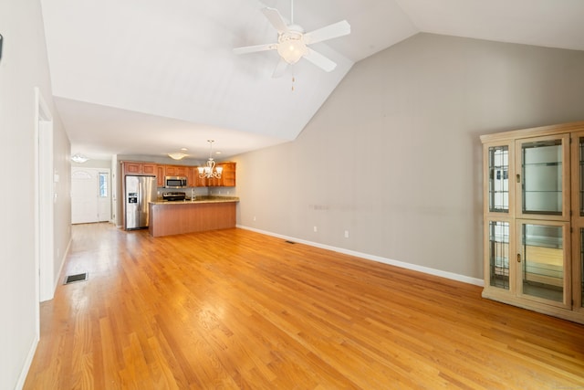 44 Forshaw Ave Unit 44, Plainville, CT 06062 - unfurnished living room with a chandelier, high vaulted ceiling, light wood-type flooring, and ceiling fan