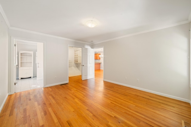 44 Forshaw Ave Unit 44, Plainville, CT 06062 - unfurnished room with ornamental molding and light wood-style floors