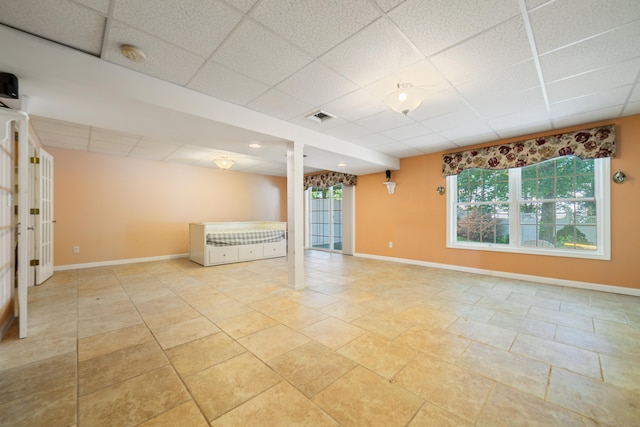 44 Forshaw Ave Unit 44, Plainville, CT 06062 - unfurnished living room featuring a drop ceiling and baseboards