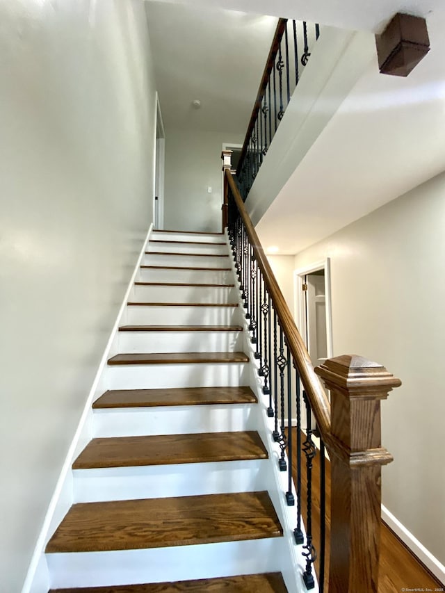 545 Simsbury Rd, Bloomfield, CT 06002 - staircase with wood finished floors and baseboards