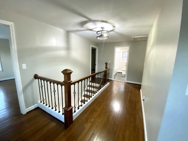 545 Simsbury Rd, Bloomfield, CT 06002 - corridor featuring an upstairs landing and wood finished floors