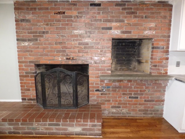 545 Simsbury Rd, Bloomfield, CT 06002 - detailed view of a fireplace and wood finished floors