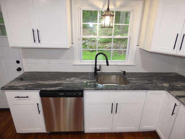 545 Simsbury Rd, Bloomfield, CT 06002 - kitchen featuring stainless steel dishwasher, white cabinets, backsplash, dark stone counters, and decorative light fixtures