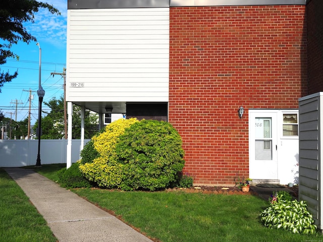 208 W Walk Unit 208, West Haven, CT 06516 - view of side of home with brick siding
