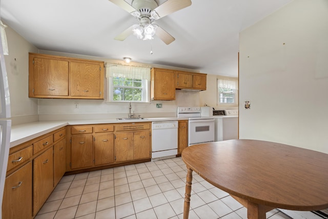 1519 Tuttle Ave, Wallingford, CT 06492 - kitchen with white appliances, healthy amount of natural light, light countertops, and a ceiling fan