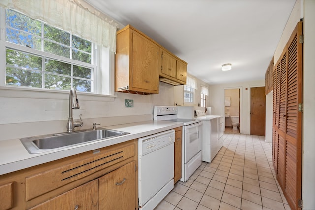 1519 Tuttle Ave, Wallingford, CT 06492 - kitchen featuring white appliances, light tile patterned flooring, washer / dryer, and light countertops
