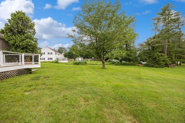 1519 Tuttle Ave, Wallingford, CT 06492 - view of grassy yard with a wooden deck