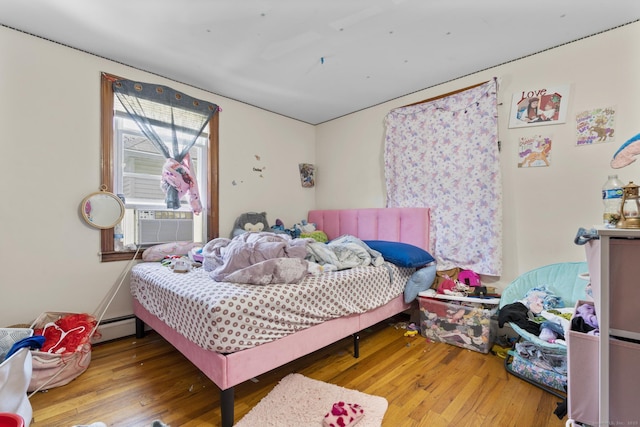 6 Houghton St, Bristol, CT 06010 - bedroom with hardwood / wood-style flooring, cooling unit, and baseboard heating