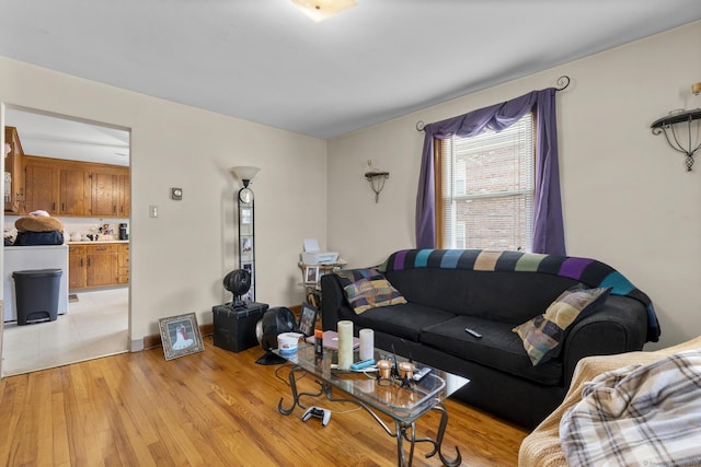 6 Houghton St, Bristol, CT 06010 - living room featuring light wood-style flooring and baseboards