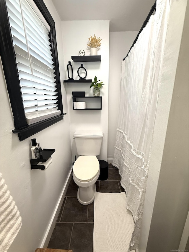 103 Starkweather St, Manchester, CT 06042 - bathroom with toilet and tile patterned floors