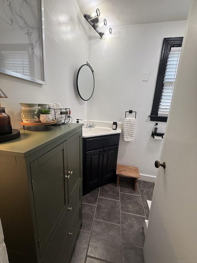 103 Starkweather St, Manchester, CT 06042 - bathroom with vanity and tile patterned flooring