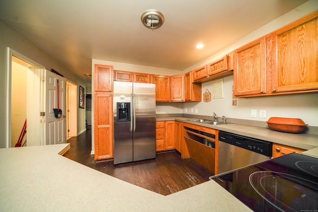 76 White St, Bridgeport, CT 06610 - kitchen with stainless steel appliances, dark wood-style flooring, light countertops, and recessed lighting