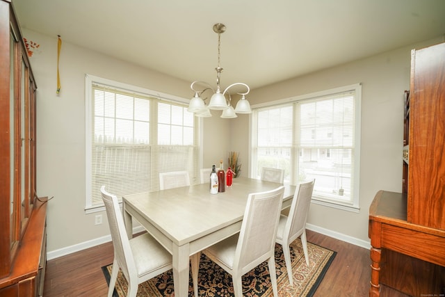 76 White St, Bridgeport, CT 06610 - dining room featuring a chandelier and dark wood finished floors