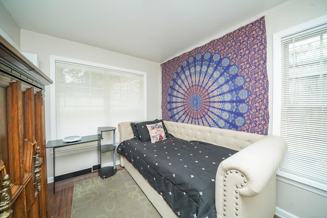 76 White St, Bridgeport, CT 06610 - bedroom with baseboards and wood finished floors