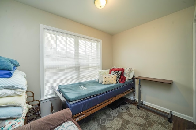 76 White St, Bridgeport, CT 06610 - bedroom with wood finished floors and baseboards